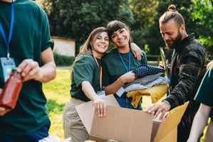 Happy employees engaging in philanthropic charity activities