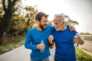 Two happy employees enjoying fitness together