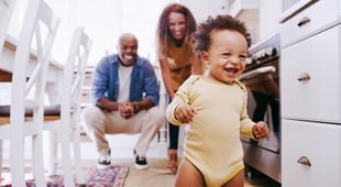 Happy baby and smiling parents