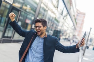 Employee cheering after receiving popular summer gift card