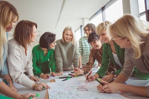 Employees playing fun team building game